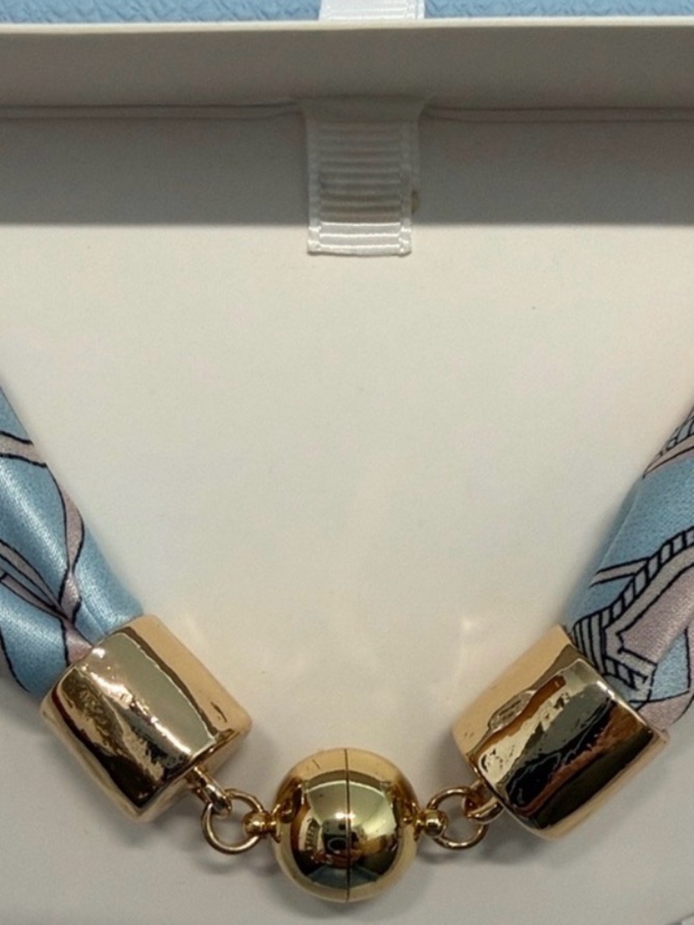 Piper K Pastel Blue and Gold Printed Silk Tube Necklace - Picture 5 of 5